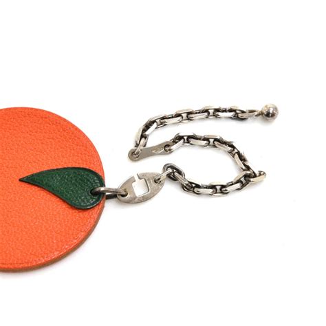 hermes orange charm|Hermes straps for handbags.